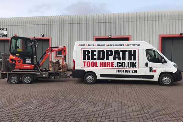 An image of the Redpath Tool Hire van moving a digger